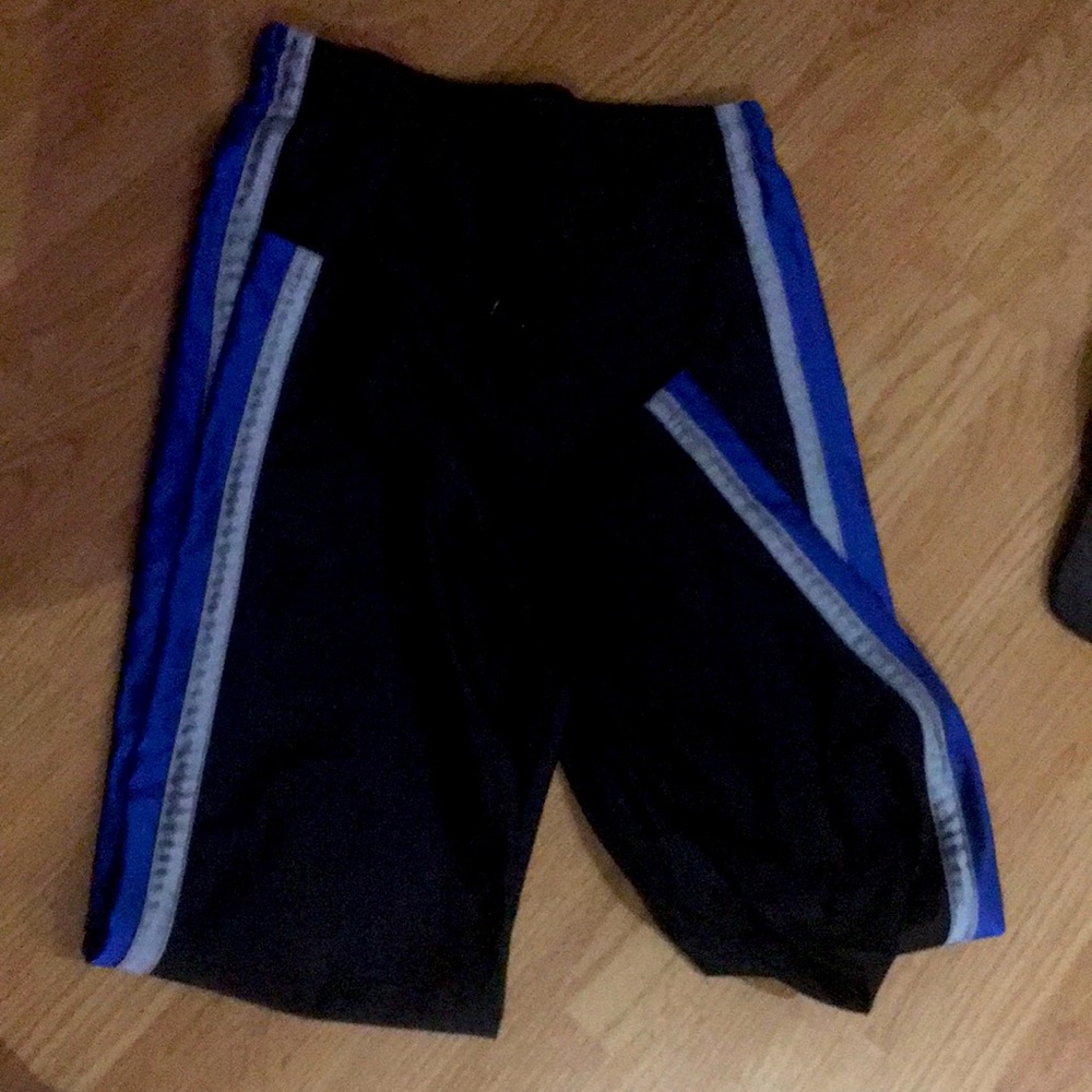 Black big sweatpants with white and blue streaks
